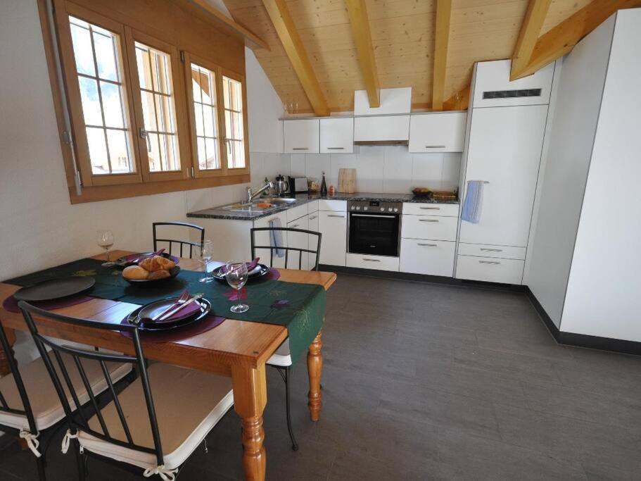 Charming Penthouse Apartment เลาเทอร์บรุนเนน ภายนอก รูปภาพ